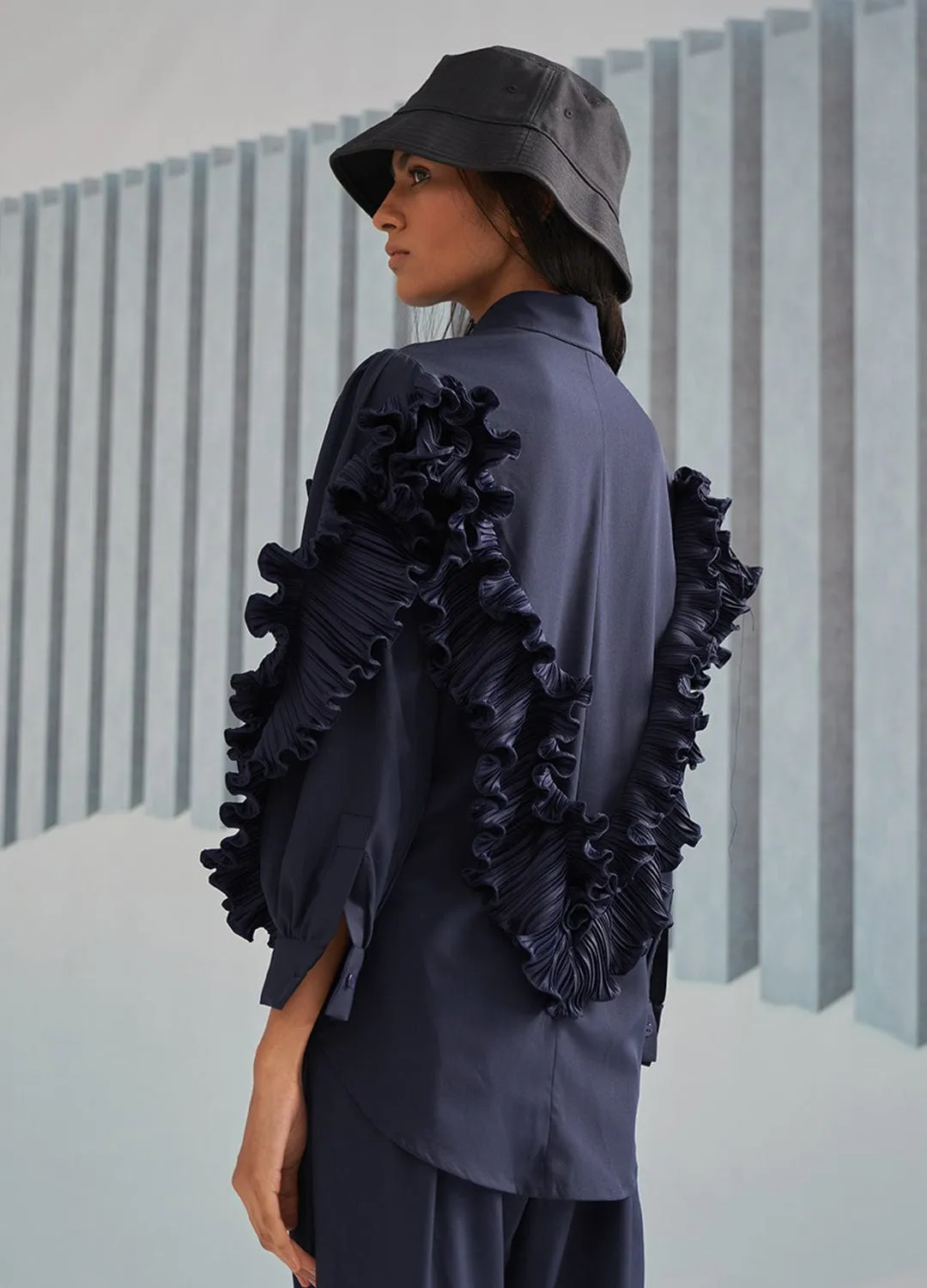 BLUE SHIRT WITH RUFFLE DETAILS