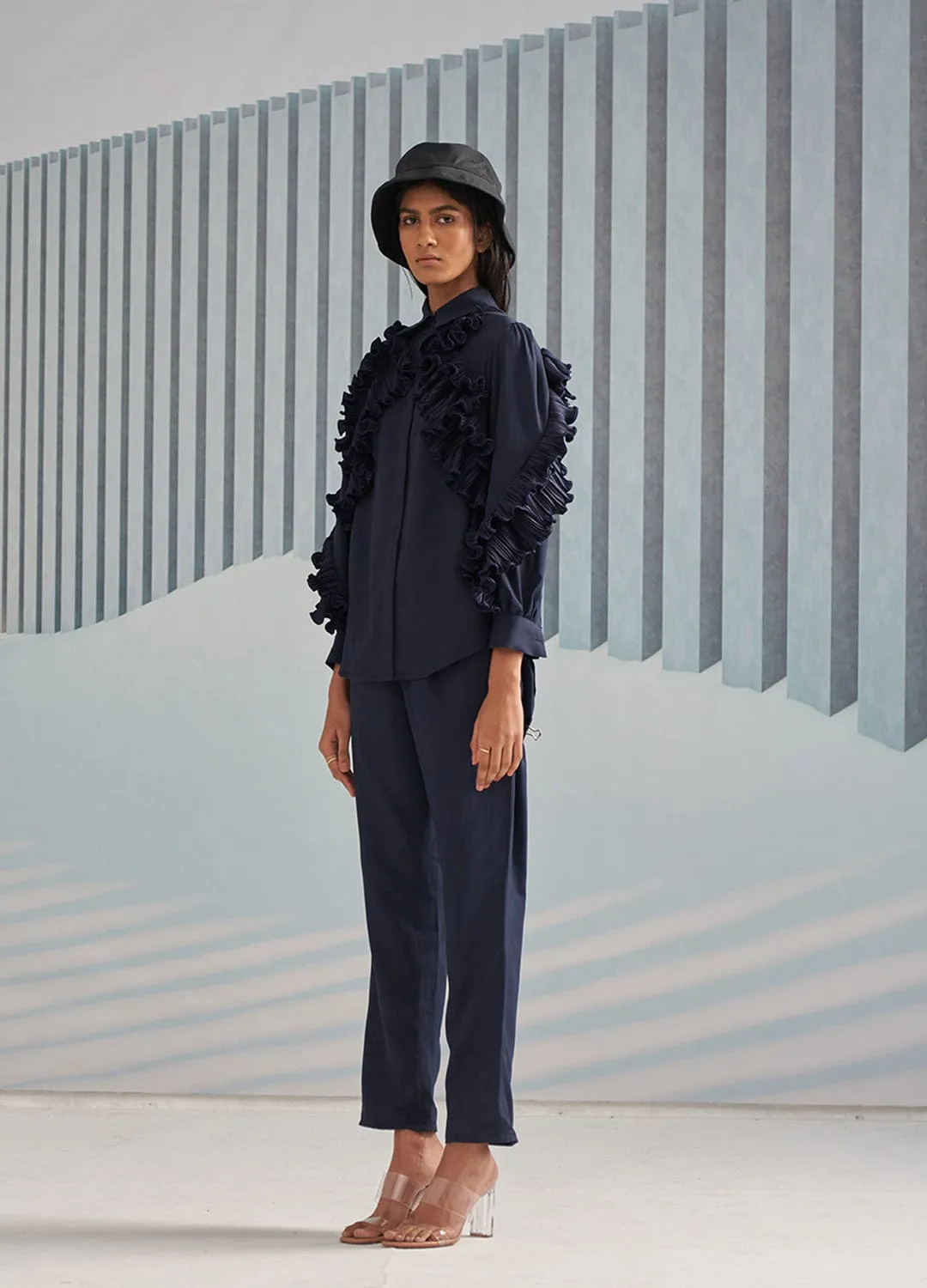 BLUE SHIRT WITH RUFFLE DETAILS