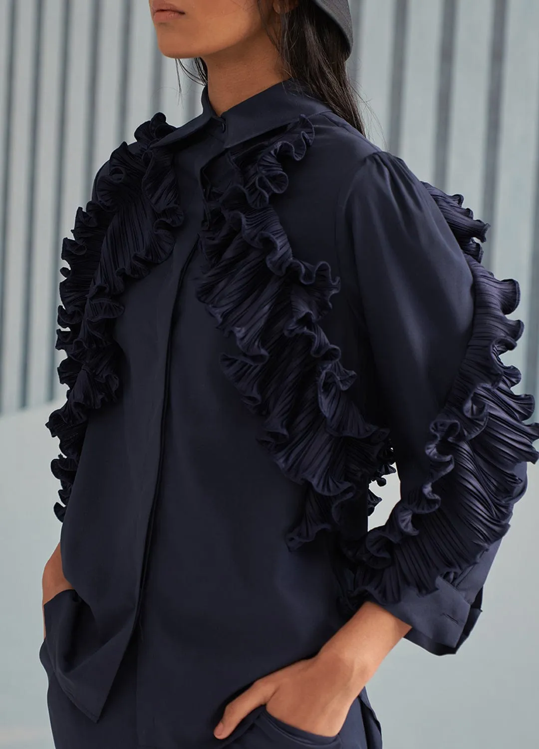 BLUE SHIRT WITH RUFFLE DETAILS