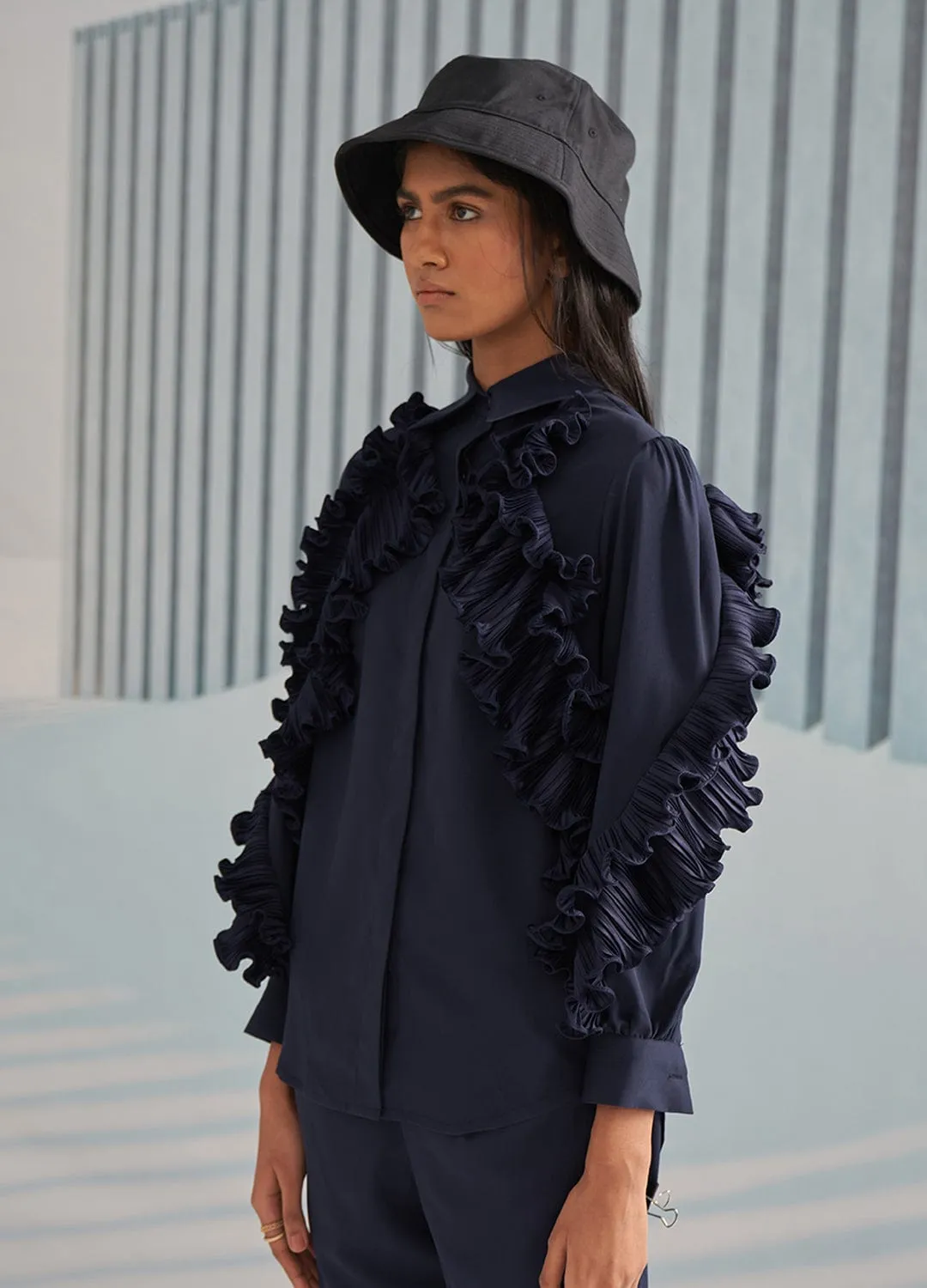 BLUE SHIRT WITH RUFFLE DETAILS